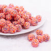 front view of a pile of 16mm Basketball Rhinestone AB Bubblegum Beads