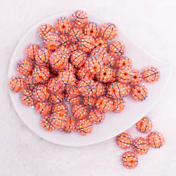 top view of a pile of 16mm Basketball Rhinestone AB Bubblegum Beads