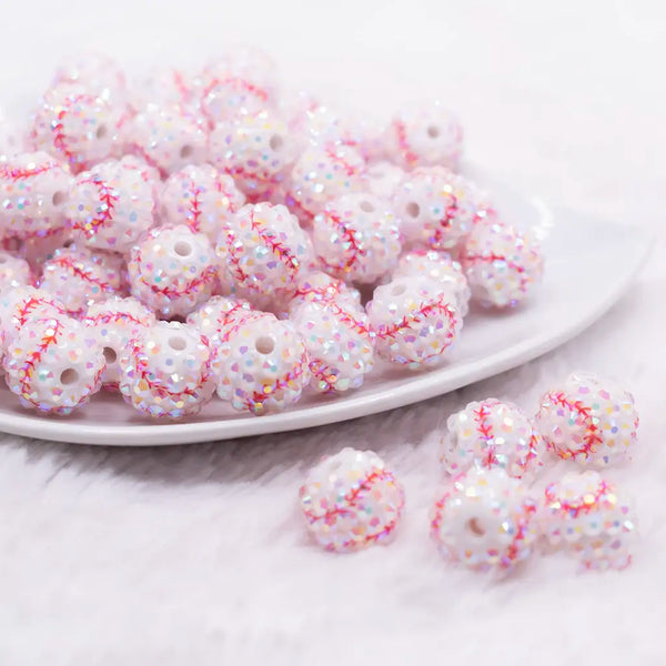 front view of a pile of 16mm Baseball Rhinestone AB Bubblegum Beads