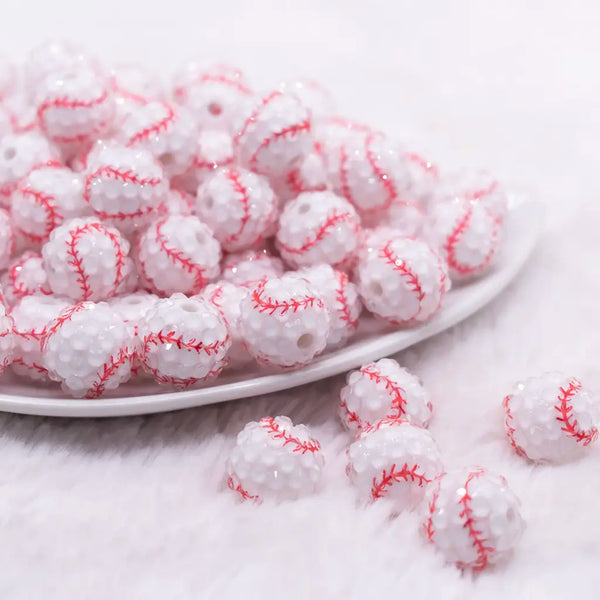 front view of a pile of 16mm Baseball with Clear Rhinestone Bubblegum Beads