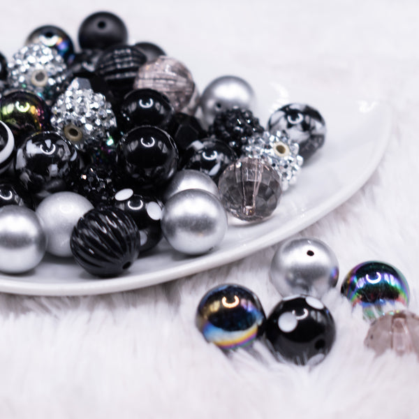 front view of a pile of 16mm Back in Black Acrylic Bubblegum Bead Mix