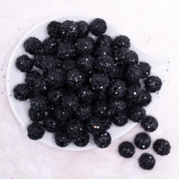 top view of a pile of 16mm Black Sequin Confetti Bubblegum Beads