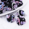 close up view of a pile of Copy of 20mm Black luxury acrylic beads with iridescent butterfly accents