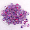 top view of a pile of 16mm Purple and Hot Pink Splatter Bubblegum Bead