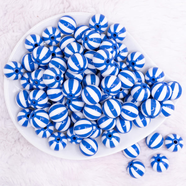 top view of a pile of 16mm Royal Blue and White Beach Ball Bubblegum Beads