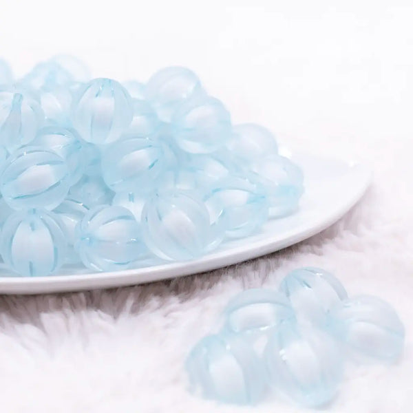 front view of a pile of 16mm Blue Frosted Pumpkin Shaped Bubblegum Bead