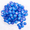 top view of a pile of 16mm Bright Blue Illusion Glitter Bubblegum Bead