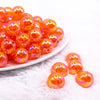 front view of a pile of 16mm Bright Orange Crackle AB Bubblegum Beads