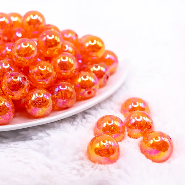 front view of a pile of 16mm Bright Orange Crackle AB Bubblegum Beads