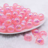 front view of a pile of 16mm Bright Pink Opalescence Bubblegum Bead