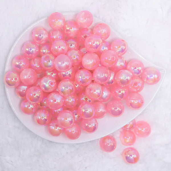 top view of a pile of 16mm Bright Pink Opalescence Bubblegum Bead