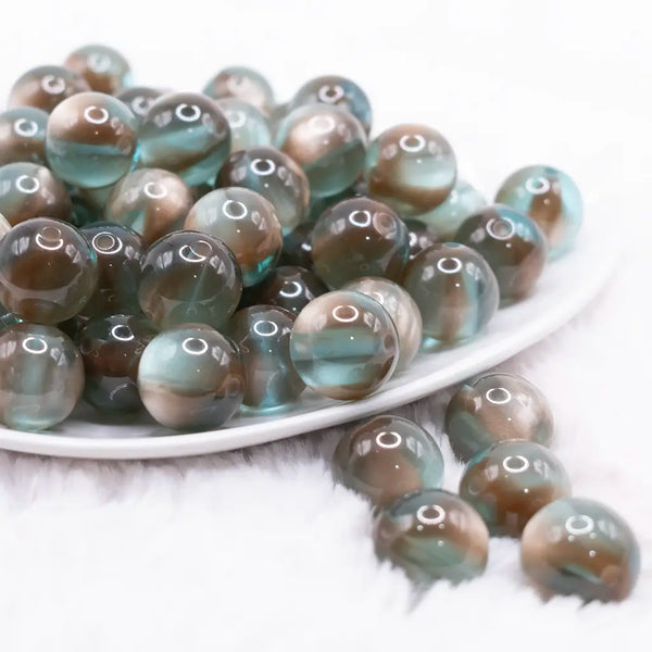 front view of a pile of 16mm Greenish Brown Illusion Glitter Bubblegum Bead