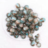 top view of a pile of 16mm Greenish Brown Illusion Glitter Bubblegum Bead