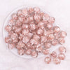 top view of a pile of 16mm Champagne Gold Rose Bubblegum Beads