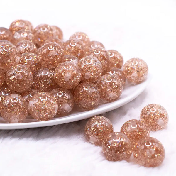 front view of a pile of 16mm Champagne Gold Glitter Twinkle Bubblegum Beads