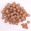 top view of a pile of 16mm Champagne Gold Glitter Twinkle Bubblegum Beads