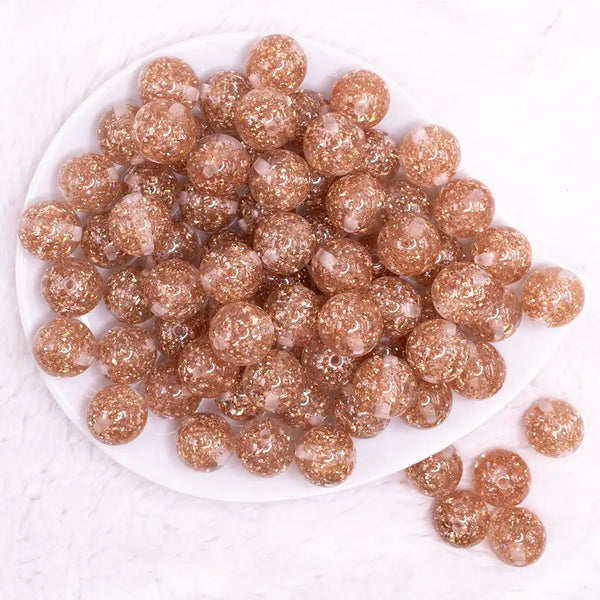 top view of a pile of 16mm Champagne Gold Glitter Twinkle Bubblegum Beads