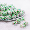 front view of a pile of 16mm Christmas Tree Print Bubblegum Bead