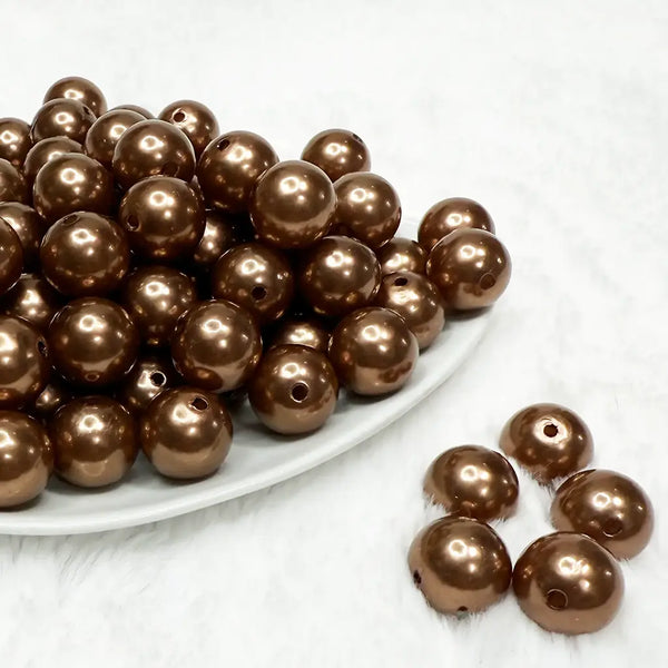 front view of a pile of 16mm Dark Copper Brown Faux Pearl Acrylic Bubblegum Beads