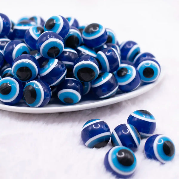front view of a pile of 16mm Evil Eye Stripe Bubblegum Beads
