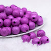 front view of a pile of 16mm Fuchsia Stardust Acrylic Bubblegum Beads