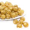 front view of a pile of 16mm Gold Glitter Twinkle Bubblegum Beads