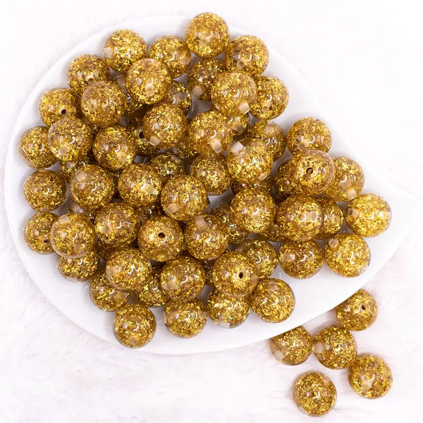 top view of a pile of 16mm Gold Glitter Twinkle Bubblegum Beads