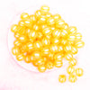 top view of a pile of 16mm Golden Yellow Frosted Pumpkin Shaped Bubblegum Bead