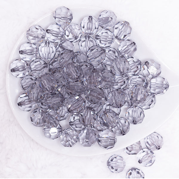 top view of a pile of 16mm Gray Transparent Faceted Bubblegum Beads
