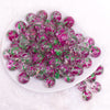 top view of a pile of 16mm Green and Purple Splatter Bubblegum Bead