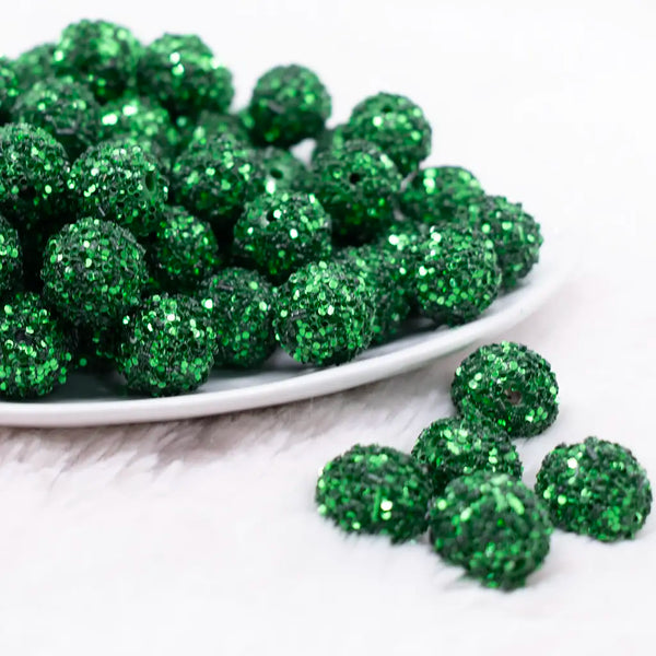 front view of a pile of 16mm Green Sequin Confetti Bubblegum Beads