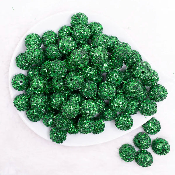 top view of a pile of 16mm Green Sequin Confetti Bubblegum Beads