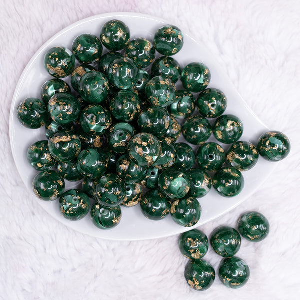 top view of a pile of 16mm Green with Gold Flake Acrylic Chunky Bubblegum Beads