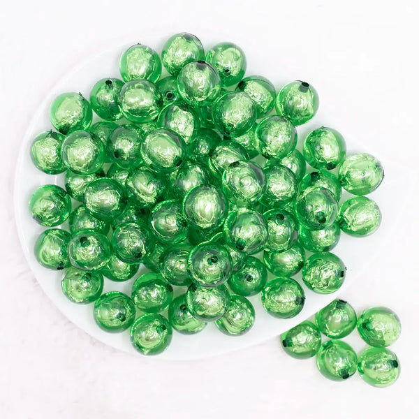 top view of a pile of 16mm Green Foil Bubblegum Beads