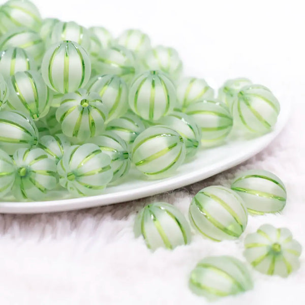 front view of a pile of 16mm Green Frosted Pumpkin Shaped Bubblegum Bead