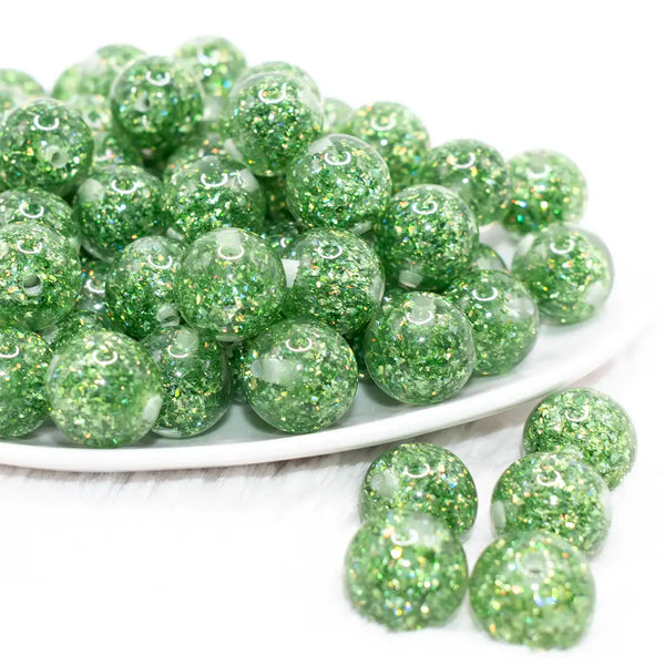 front view of a pile of 16mm Green Glitter Twinkle Bubblegum Beads