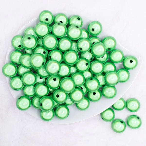 top view of a pile of 16mm Green Miracle Bubblegum Bead