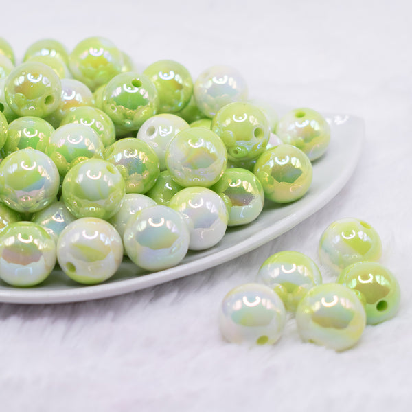 front view of a pile of 16mm Green Ombre Solid AB Bubblegum Beads