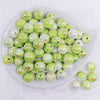top view of a pile of 16mm Green Ombre Solid AB Bubblegum Beads