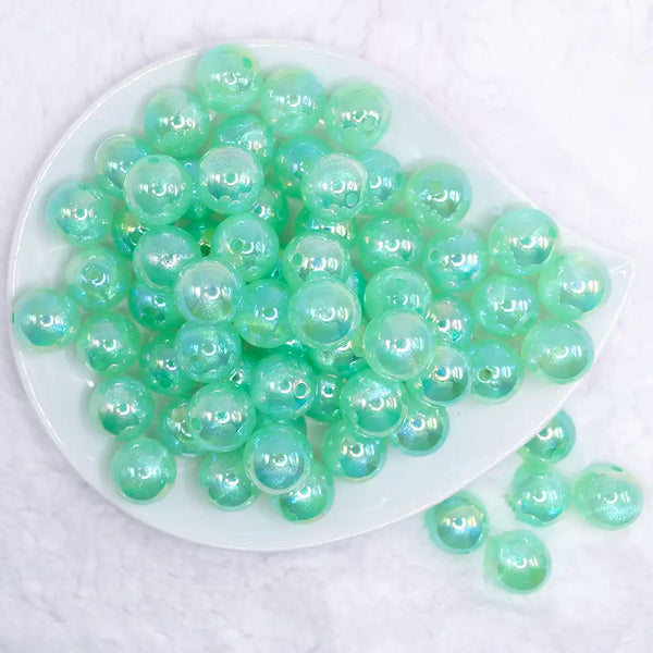 top view of a pile of 16mm Green Opalescence Bubblegum Bead