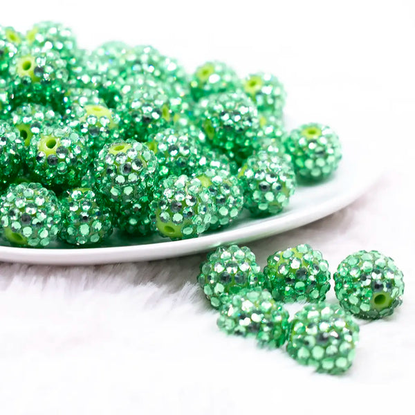front view of a pile of 16mm Green Rhinestone AB Bubblegum Beads