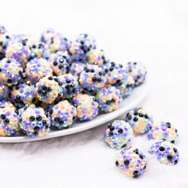 Front view of a pile of 16mm Green, Orange, Purple and Black Confetti Rhinestone Bubblegum Beads