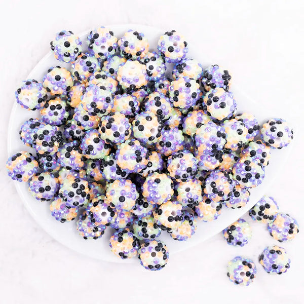 top view of a pile of 16mm Green, Orange, Purple and Black Confetti Rhinestone Bubblegum Beads