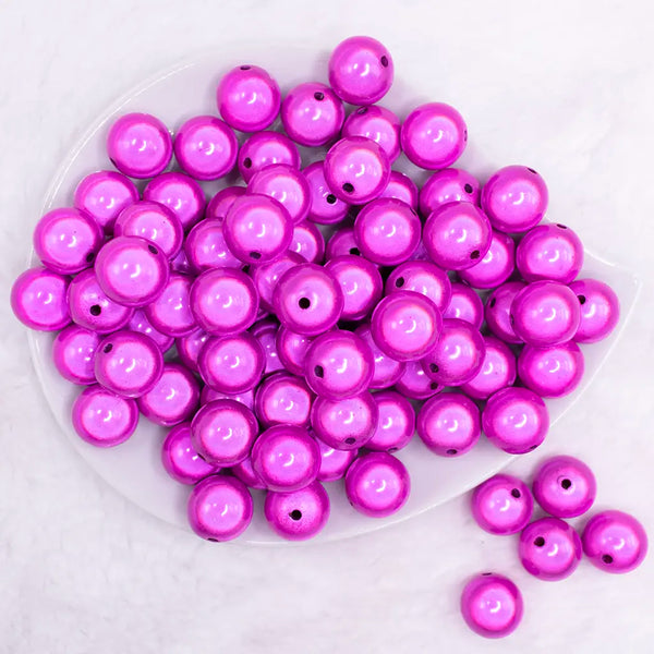 top view of a pile of 16mm Hot Pink Miracle Bubblegum Bead