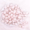 top view of a pile of 16mm Ivory Rose Bubblegum Beads
