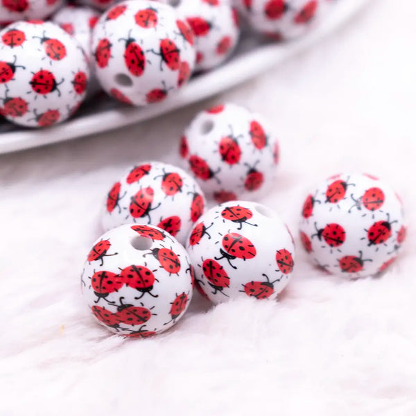 macro view of a pile of 16mm Ladybug Print Bubblegum Bead