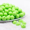 front view of a pile of 16mm Lawn Green Solid Acrylic Bubblegum Jewelry Beads