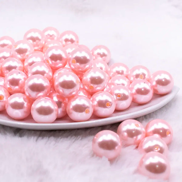 front view of a pile of 16mm Light Pink Faux Pearl Acrylic Bubblegum Jewelry Beads