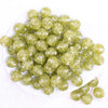 top view of a pile of 16mm Lime Green Glitter Twinkle Bubblegum Beads