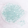 top view of a pile of 16mm Mint Green Transparent Faceted Bubblegum Beads